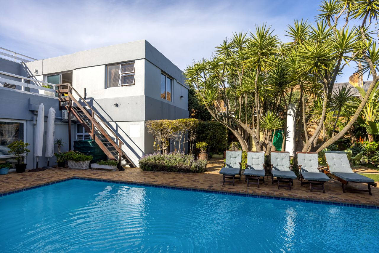Pool Area at Secret Garden Guesthouse in Bloubergstrand