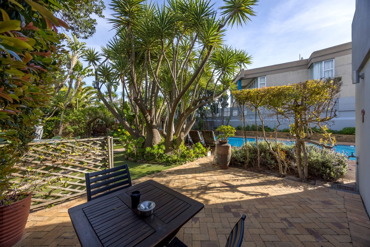 Garden at Secret Garden Guesthouse in Bloubergstrand